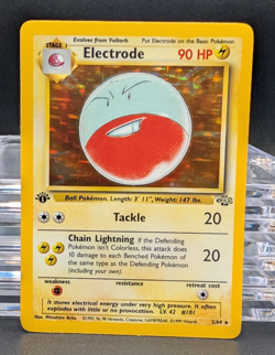 Pokemon TCG 1st Edition Electrode 2/64 Jungle Rare Holo Card WOTC - Image 1