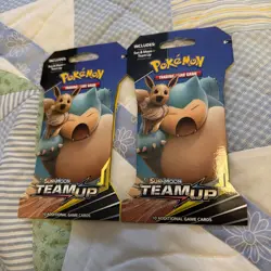 2x Pokemon TCG Sun & Moon Team Up Sleeved Hanger Booster Pack Eevee & Snorlax - Image 1