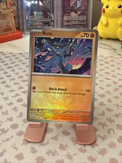 Pokemon TCG Prismatic Evolutions Riolu Card 050/131 Master Ball Reverse Holo - Image 1