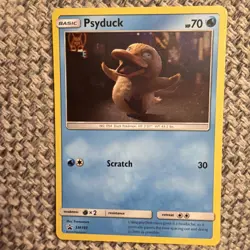 Pokemon TCG - Psyduck SM199 - Black Star Promo Cosmos Holo - Image 1