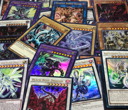 YUGIOH PREMIUM DRAGONS LOT! GUARANTEED BLUE-EYES OR SLIFER! ALL HOL + Bonus Gift - Image 1