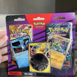 Pokemon 2 Pack Blister Pack - Team Rocket's Articuno, Zapdos & Tyranitar Cards - Image 1
