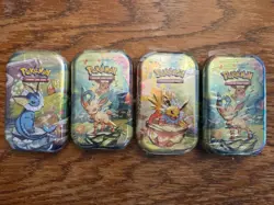 Lot Of 4 Pokemon Prismatic Evolutions Mini Tins Sealed - Image 1