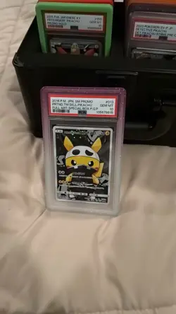 PSA 10 Team Skull Pretend Pikachu 013/SM-P Promo Holo Pokemon Card Japanese 2016 - Image 1