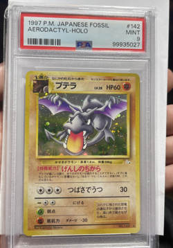 1997 POKEMON JPN FOSSIL #142 AERODACTYL-HOLO PSA 9 - Image 1