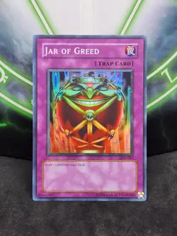 Yugioh Jar of Greed LON-EN047 Super Rare LP - Image 1