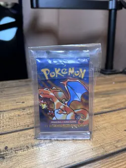 Pokemon 1st Edition Shadowless Base Set SEALED Booster Pack (Charizard Art) - Image 1