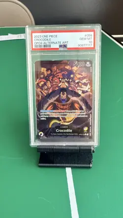 2023 ONE PIECE OP04-KINGDOMS OF INTRIGUE ALTERNATE ART #058 CROCODILE PSA 10 - Image 1