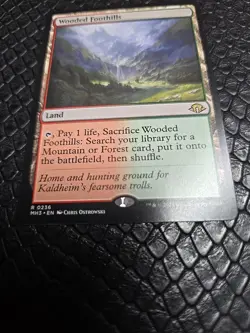 Magic The Gathering: Wooded Foothills Modern Horizons 3 Regular - Image 1