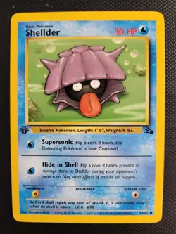1999 Pokemon Fossil - 1st Edition - Shellder - 54/62 - NM/MT - Image 1