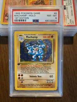 1999 POKEMON BASE SET 1ST EDITION #8 MACHAMP-HOLO PSA 8 NM-MT - Image 1