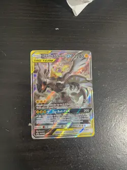 Pokemon TCG Pikachu & Zekrom GX Black Star Promo Card SM168 LP - Image 1