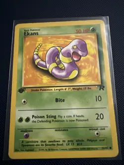 Ekans 56/82 1st Edition Team Rocket Pokemon Card MP/HP - Image 1