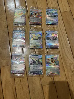 Prismatic Evolutions Surprise Box Sealed Stamped EX Promo Cards 9/9 Complete Set - Image 1