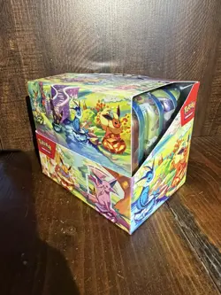 Pokemon TCG Prismatic Evolutions Full Set of 8 Sealed Mini Tins With Display - Image 1