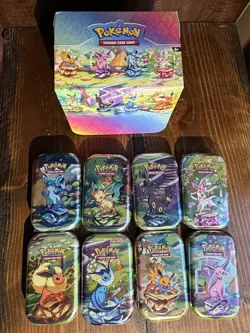 Pokemon TCG Prismatic Evolutions Full Set of 8 Sealed Mini Tins With Display - Image 2