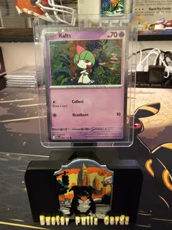 Ralts 058/132 Me01: Mega Evolution - COSMOS HOLO CARD pokemon - Image 1