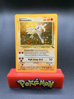 1999 Pokemon Hitmonlee Holo Rare Fossil 7/62 LP/NMT Card - Image 1