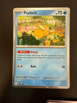 Psyduck 007 Pokemon ME01 Mega Evolution Black Star Promo Card Cosmos Holo - Image 2