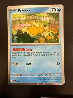 Psyduck 007 Pokemon ME01 Mega Evolution Black Star Promo Card Cosmos Holo - Image 3