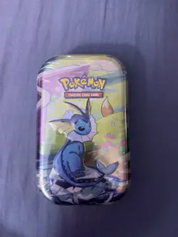 Pokemon TCG - Prismatic Evolutions Mini Tin (Vaporeon) Factory Sealed - Image 1
