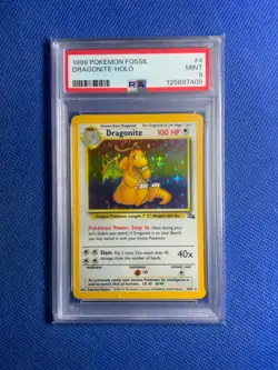 1999 POKEMON FOSSIL #4 DRAGONITE-HOLO PSA 9 - Image 1