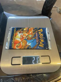 Wizards of the Coast 1999 Pokemon Base Set Sealed Booster Pack - Charizard Art - Image 1
