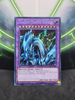Yugioh Dragon Master Knight LCKC-EN065 Secret Rare 1st Edition NM - Image 1