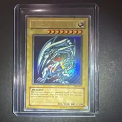 Yu-Gi-Oh! Blue-Eyes White Dragon SDK-001 Heavily Played Unlimited Edition - Image 1