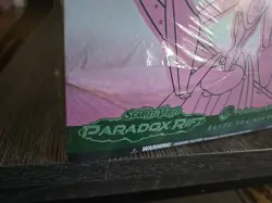 Paradox Rift Pokemon Center ETB Iron Valiant Sealed With A Tear In The Front - Image 2