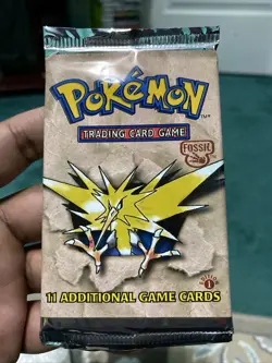 Pokemon Booster Pack 1st Edition Fossil, Sealed Pack, WOTC, Zapdos Artwork - Image 1
