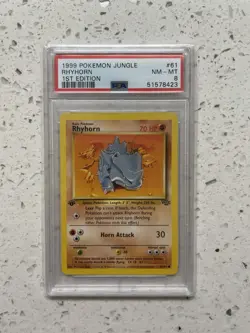 Rhyhorn 1st Ed PSA 8 #61/64 Jungle Common Pokemon 1999 - Image 1