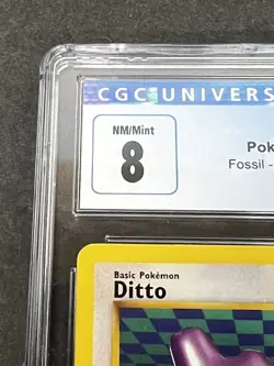 1999 Pokemon Fossil 1st Edition DITTO 18/62 Non-Holo Rare CGC 8 Slab Card - Image 2