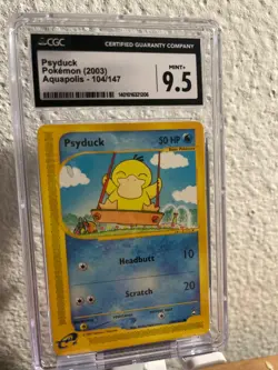Psyduck 104/147 Aquapolis Non-Holo Pokemon Card The BEST Pokemon! E-reader - Image 1