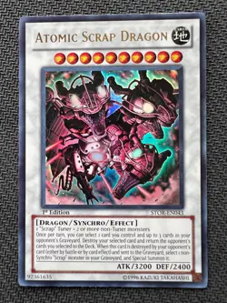 Yugioh Atomic Scrap Dragon 1st Edition Ultra Rare STOR-EN043 LP - Image 1