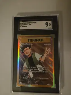 2016 Pokemon Evolutions Brock's Grit Trainer #107 Holo SGC 9 - Image 1