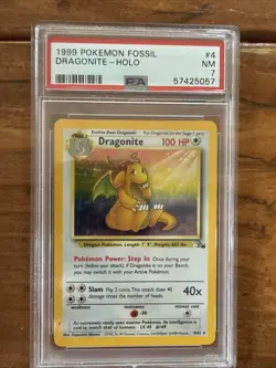 1999 Pokemon Fossil Dragonite 4/62 Holo PSA 7 - Image 1