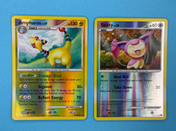 2009 Pokemon Platinum Ampharos 1/127 and Skitty 93/127 Reverse Holo Cards - Image 1
