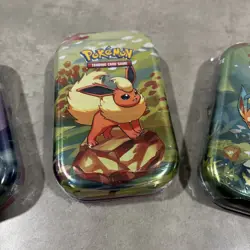 Pokemon Prismatic Mini Tins Lot of 4 - Factory Sealed - Image 3
