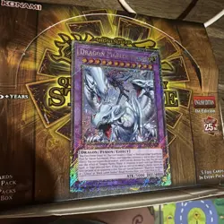 Dragon Master Magia - Platinum Secret Rare RA04 - 1st Ed - EN055 - Stampede - Image 1