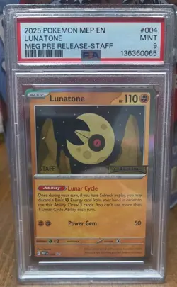 2025 POKEMON MEP PROMO MEGA EVOLUTION PRERELEASE-STAFF #004 LUNATONE PSA 9 - Image 1