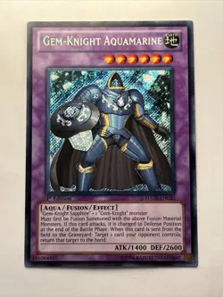 YUGIOH! 1-GEM-KNIGHT AQUAMARINE-SECRET RARE-1ST EDITION-HA05-EN020 - Image 1