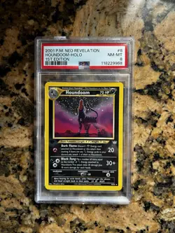 Pokemon Neo Revelation 1st Edition Houndoom Holo PSA 8 - Image 1