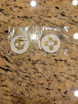 Pokemon TCG Metal Status Coins Burn & Poison Skull Band Aids Gold & White - Image 1