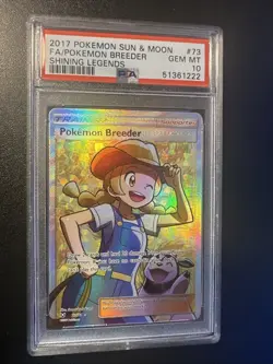2017 POKEMON SUN & MOON SHINING LEGENDS #73 FULL ART/POKEMON BREEDER PSA 10 - Image 1