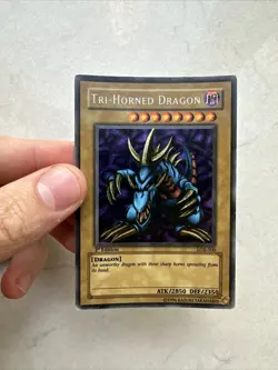 Yugioh Tri Horned Dragon LOB-000 Secret Rare 1st Edition North American Wavy - Image 1