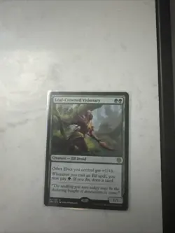 Leaf-Crowned Visionary Dominaria United Regular - Image 1