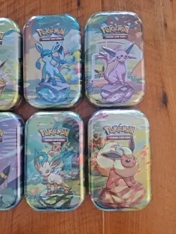 Pokemon TCG Prismatic Evolutions Mini Tins Set of 8 Brand New Factory Sealed - Image 3
