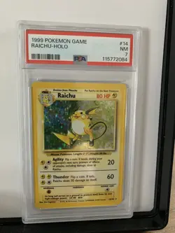 1999 Pokemon Raichu Holo Rare Card 14/102 Base Set, PSA 7 Near Mint - Image 1