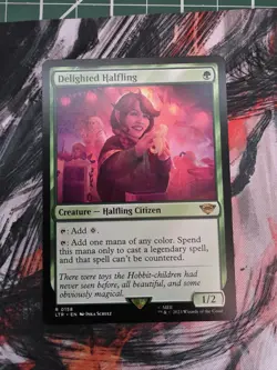 Magic The Gathering: Delighted Halfling, Universes Beyond: The Lord of the Rings - Image 1